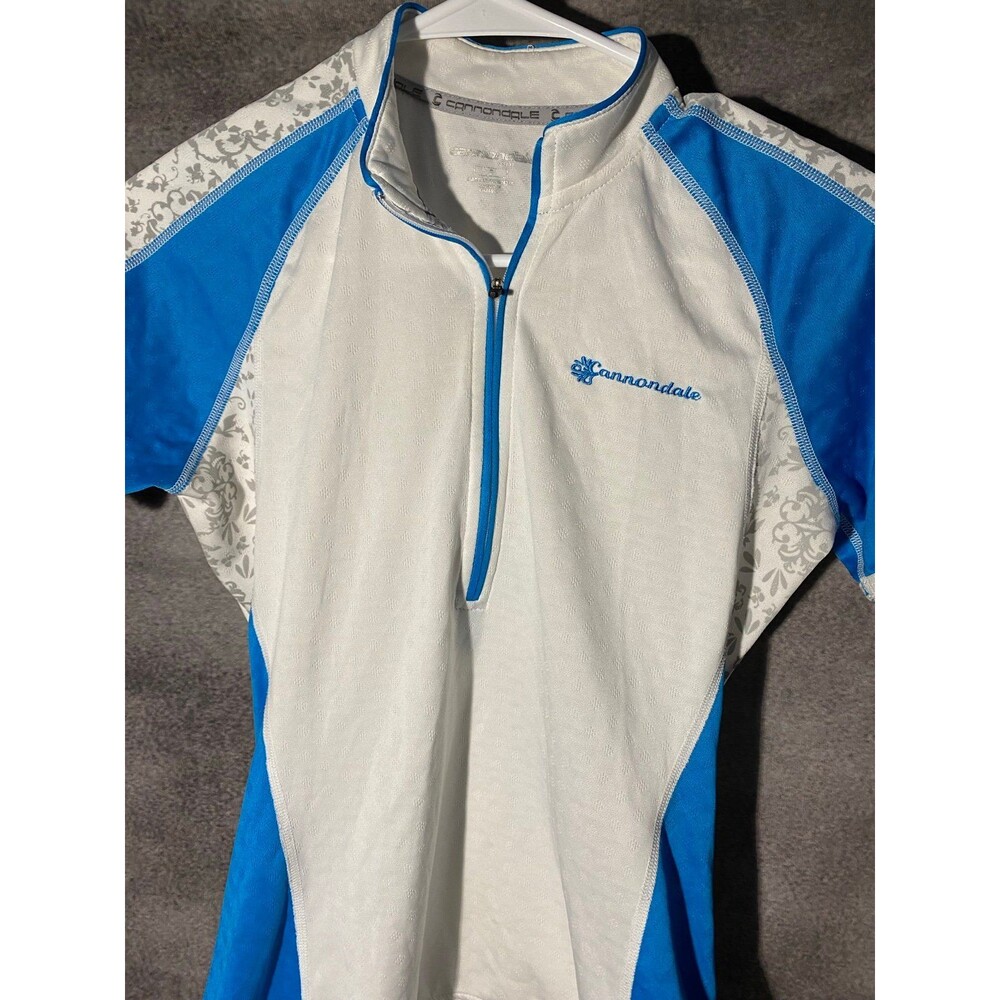 Cannondale Women Small Cycling Jersey Blue White Floral 1/4 Zip 3 Pocket - Picture 2 of 10